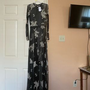 Dress see through material. Runs smaller than size